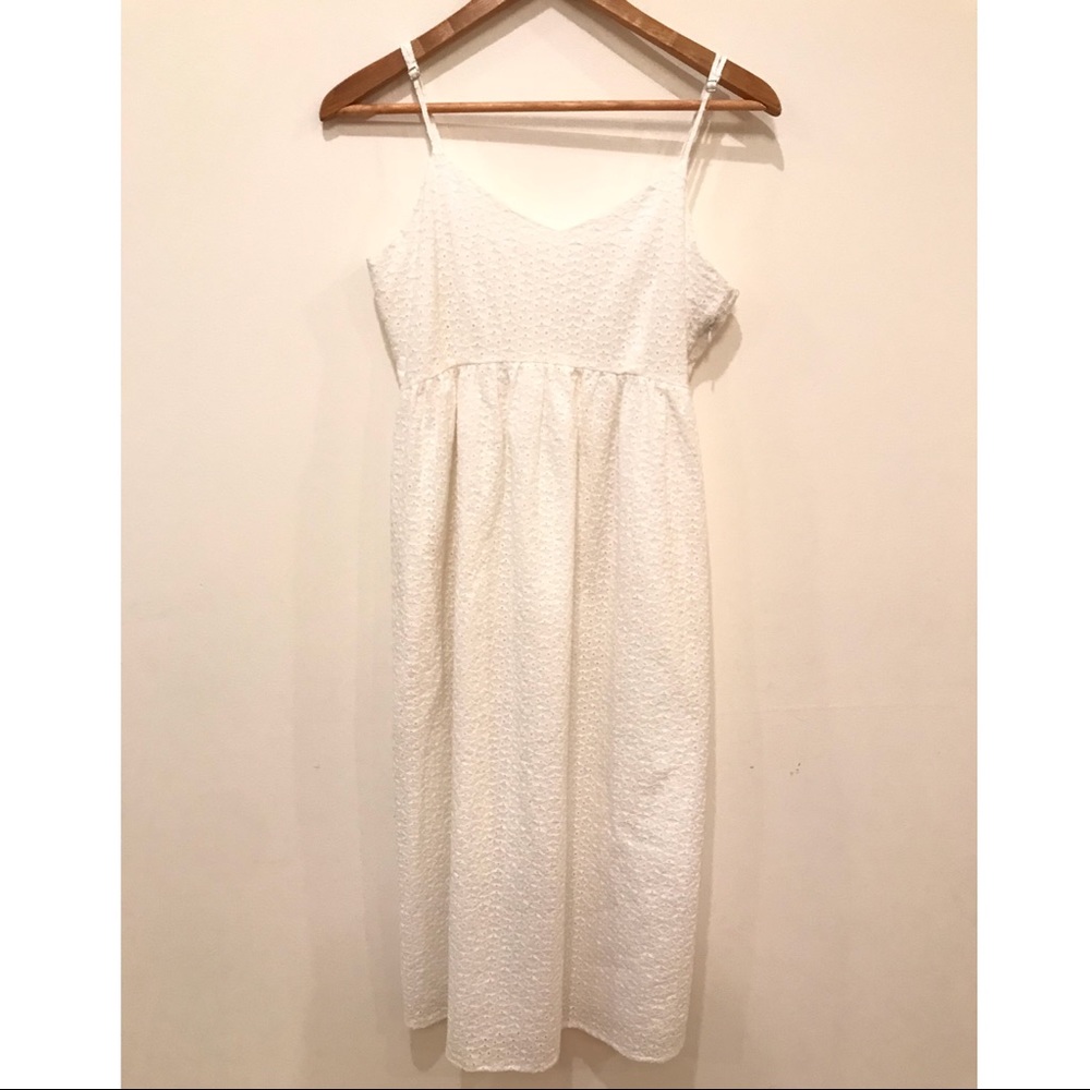 Sleeveless white midi dress